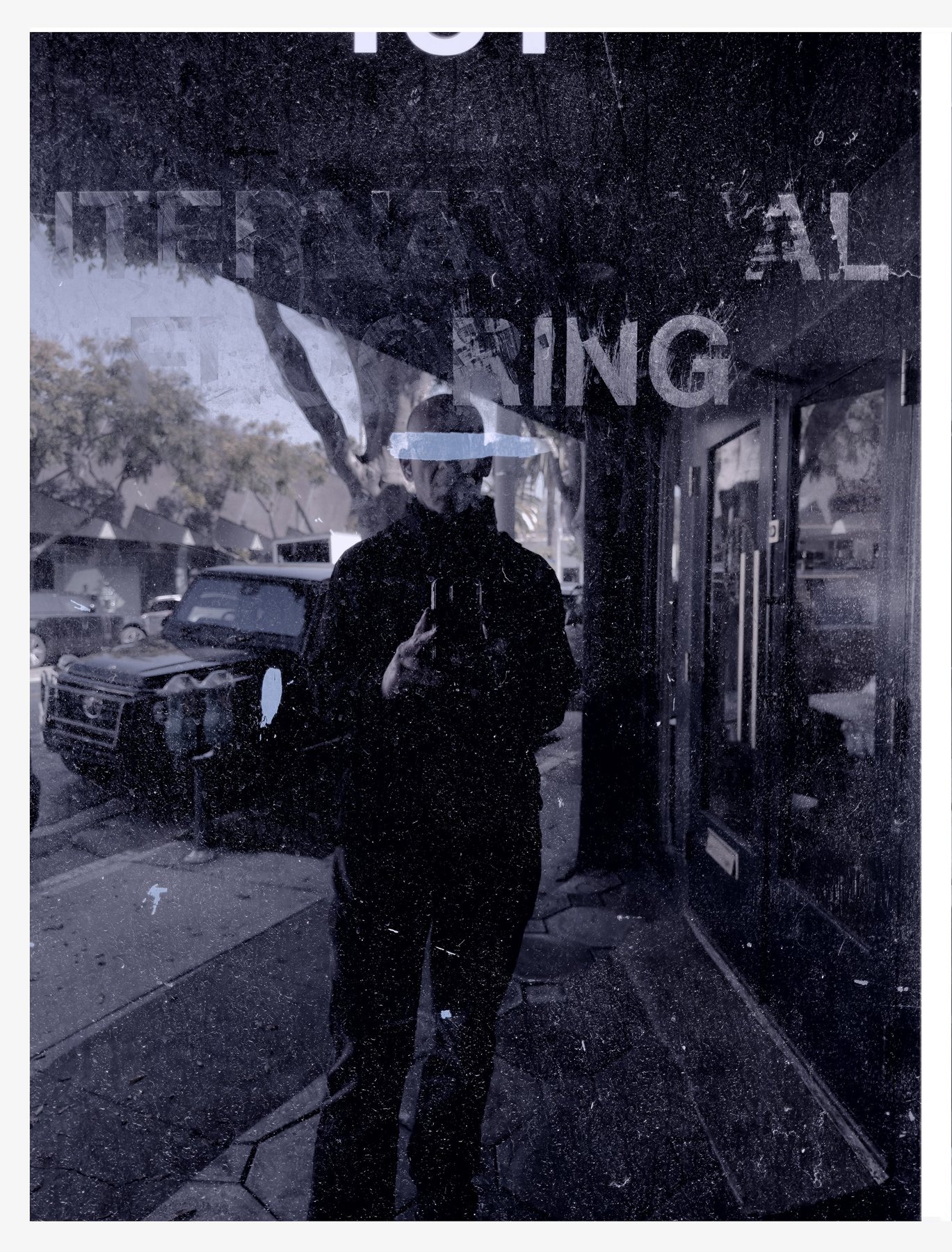 No End In Sight 142: The artist's reflection in a scratched, blue-toned window with partial lettering reading INTERNATIONAL, a parked car and parking meters.