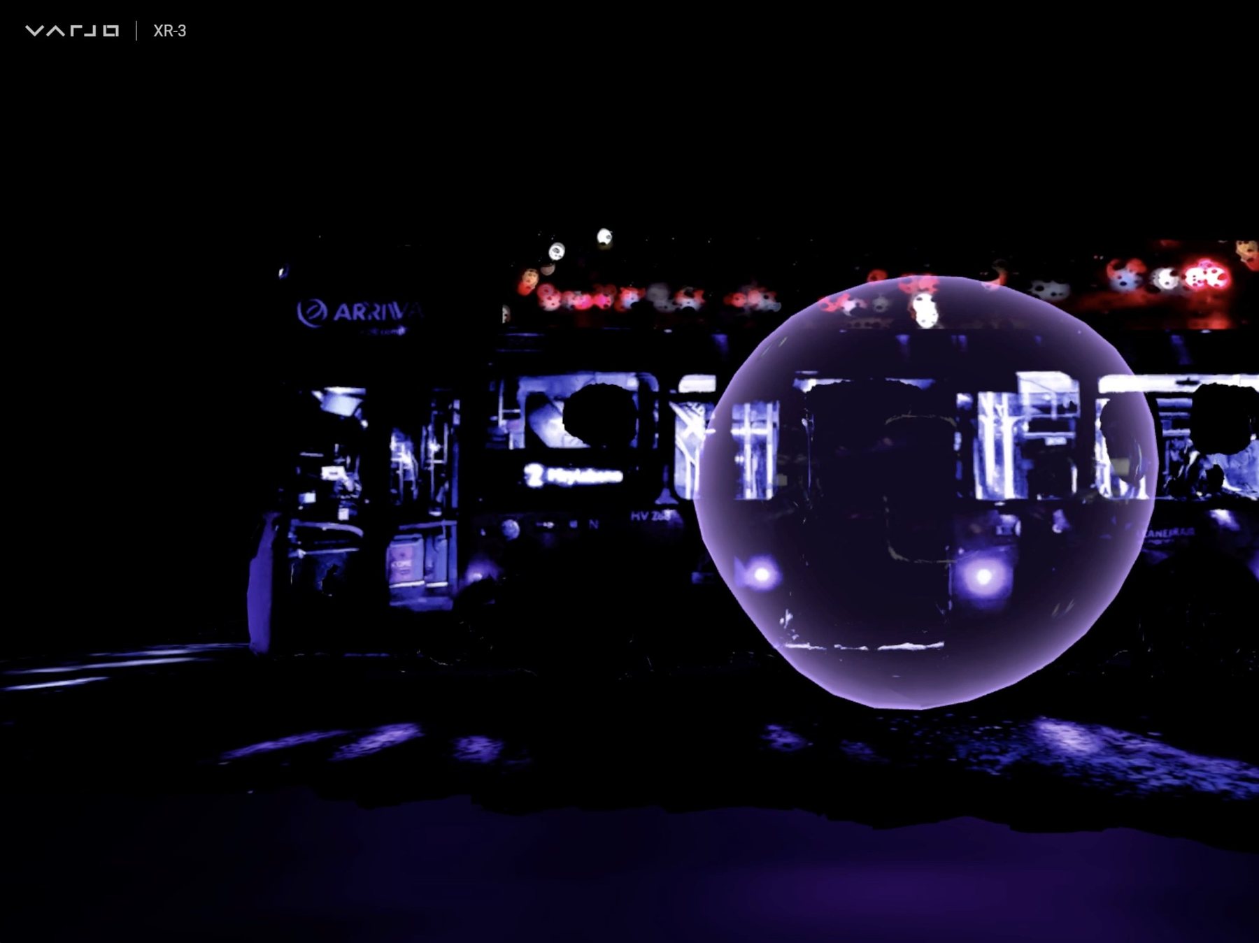 Varjo XR-3 view of a glowing translucent sphere beside a night bus marked ARRIVA, in violet light on a black ground.